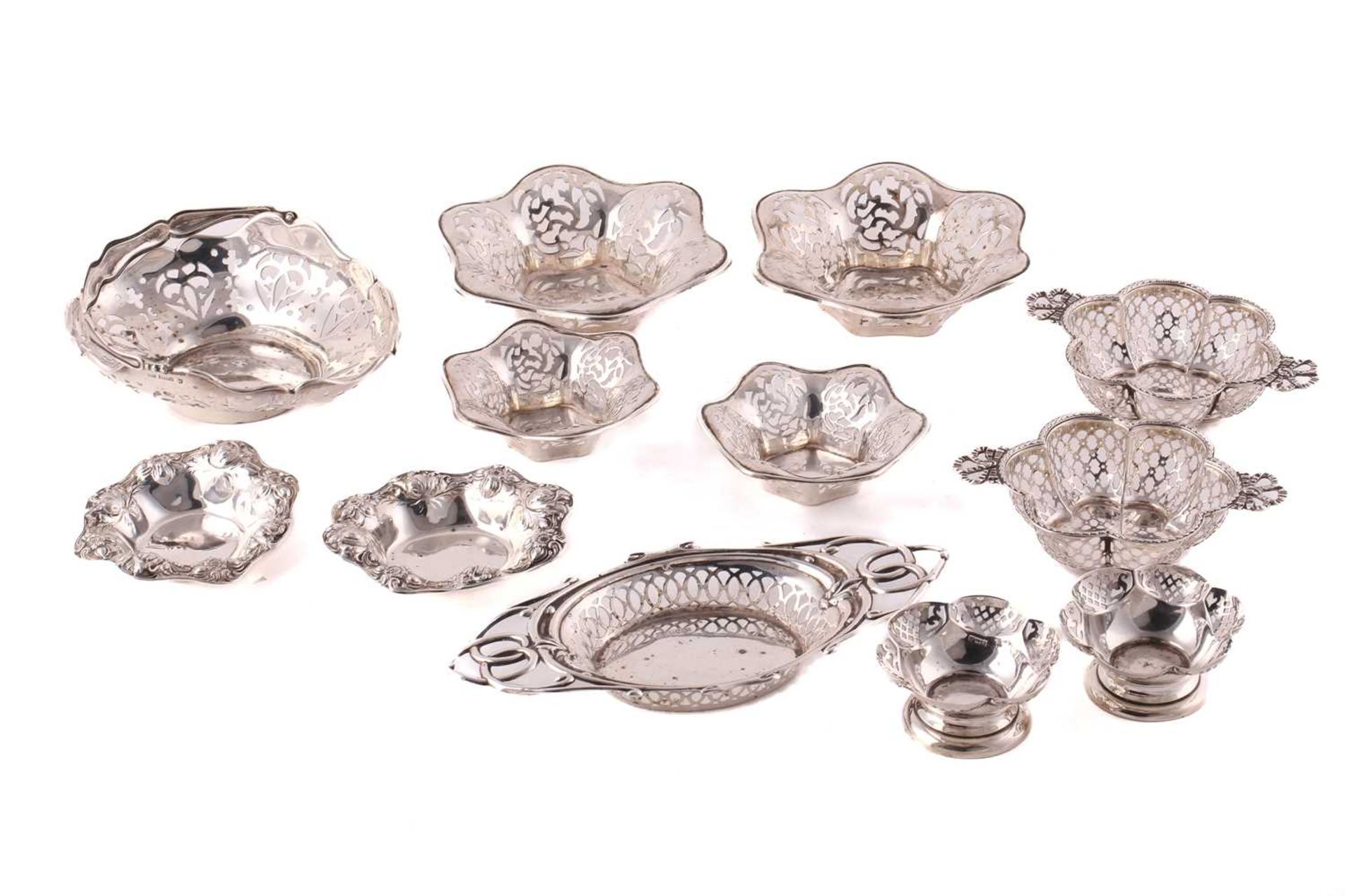 A collection of five pairs of silver bonbon dishes including a pair of early 20th century pair of