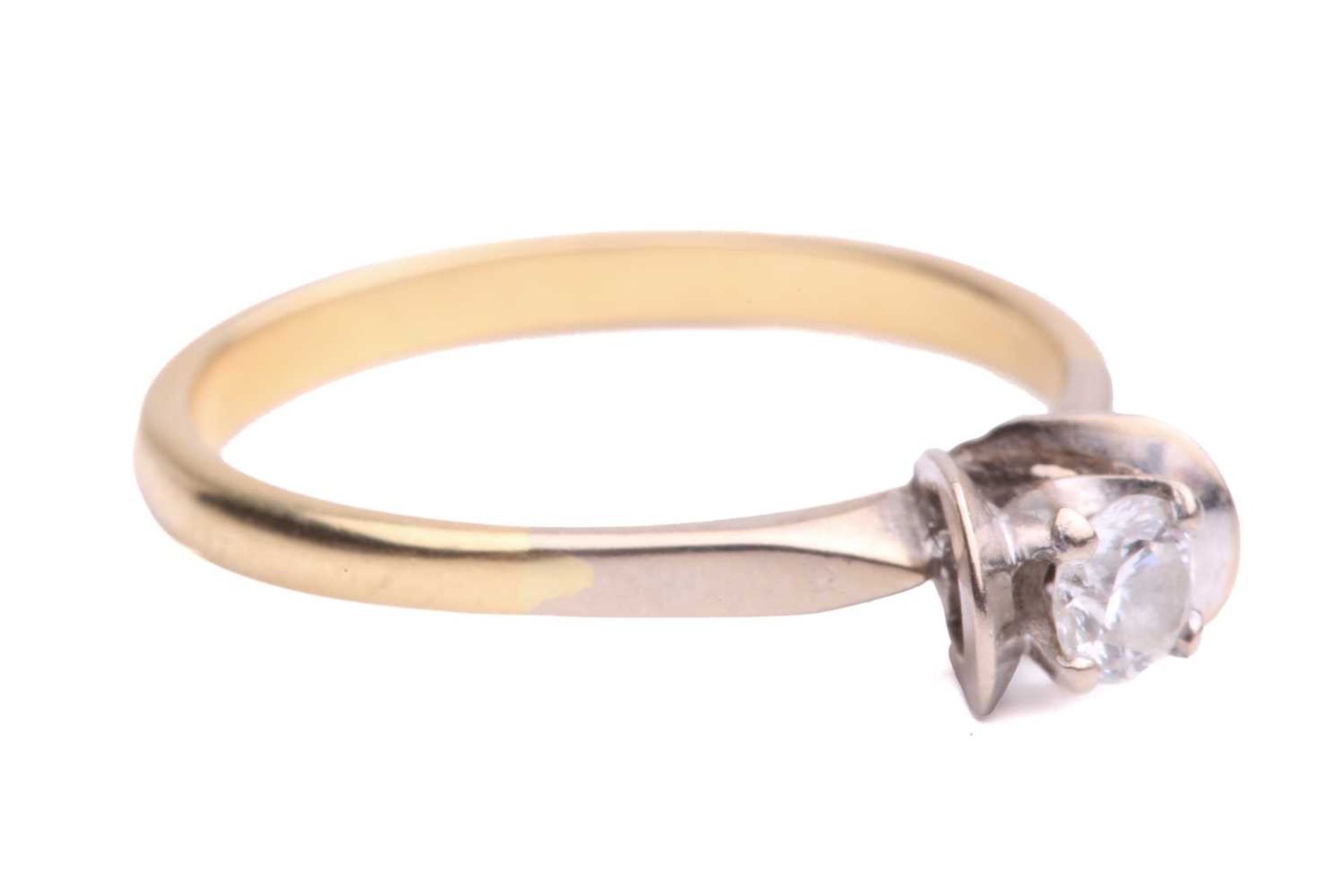 A single stone diamond ring; the round brilliant cut diamond in four claw mount between scalloped - Image 2 of 4