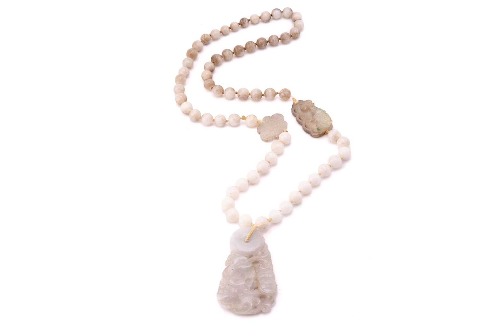 A jade pendant with quartzite bead necklace, the elongated-rectangular jade pendant with grey body