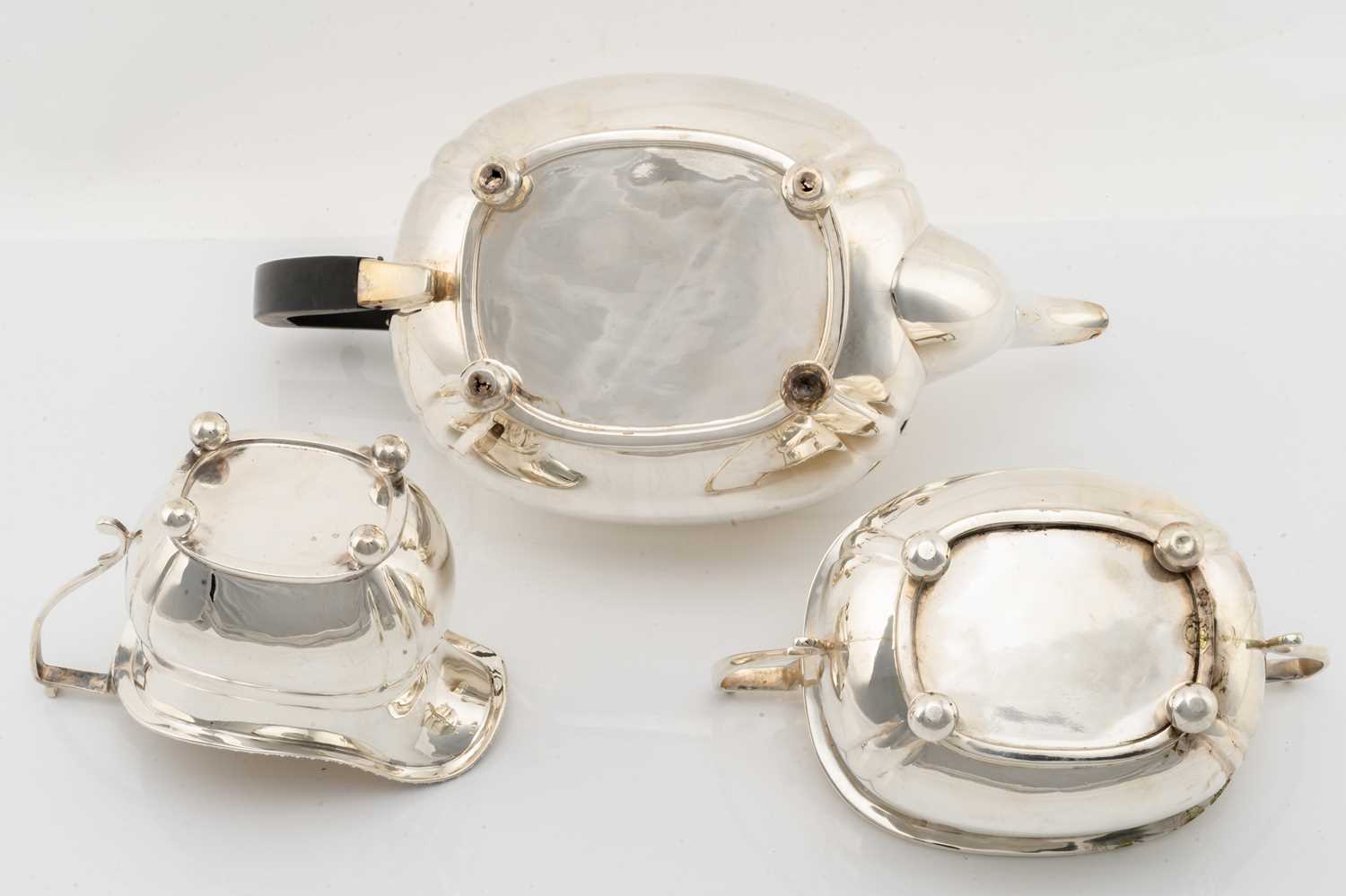 An early 20th-century silver three-piece teaset, London 1917 makers marks indistinct, the oval squat - Image 3 of 4