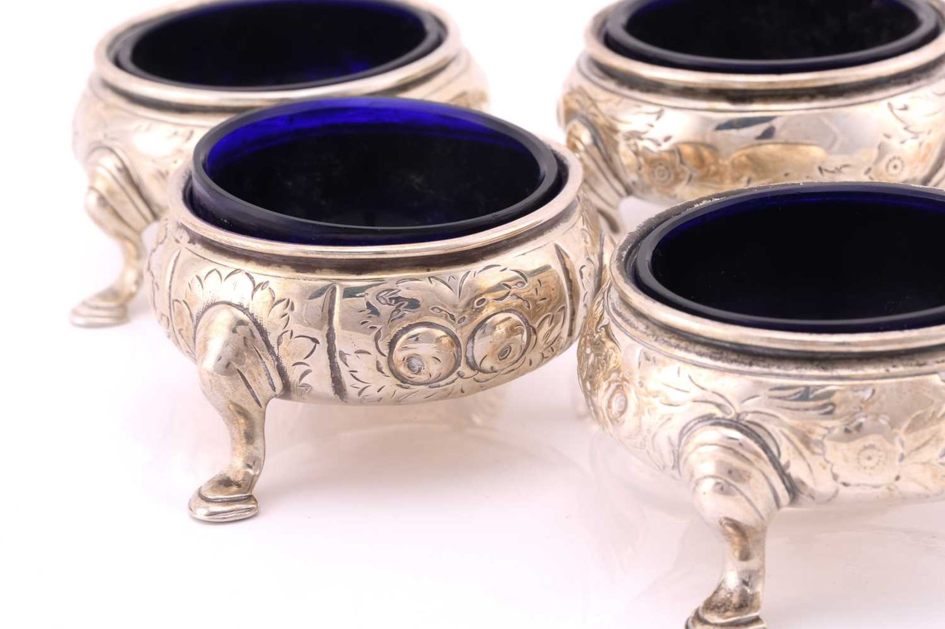 A set of four Victorian silver salt cellars, London 1841 by William Moulson, with blue glass liners, - Image 2 of 6