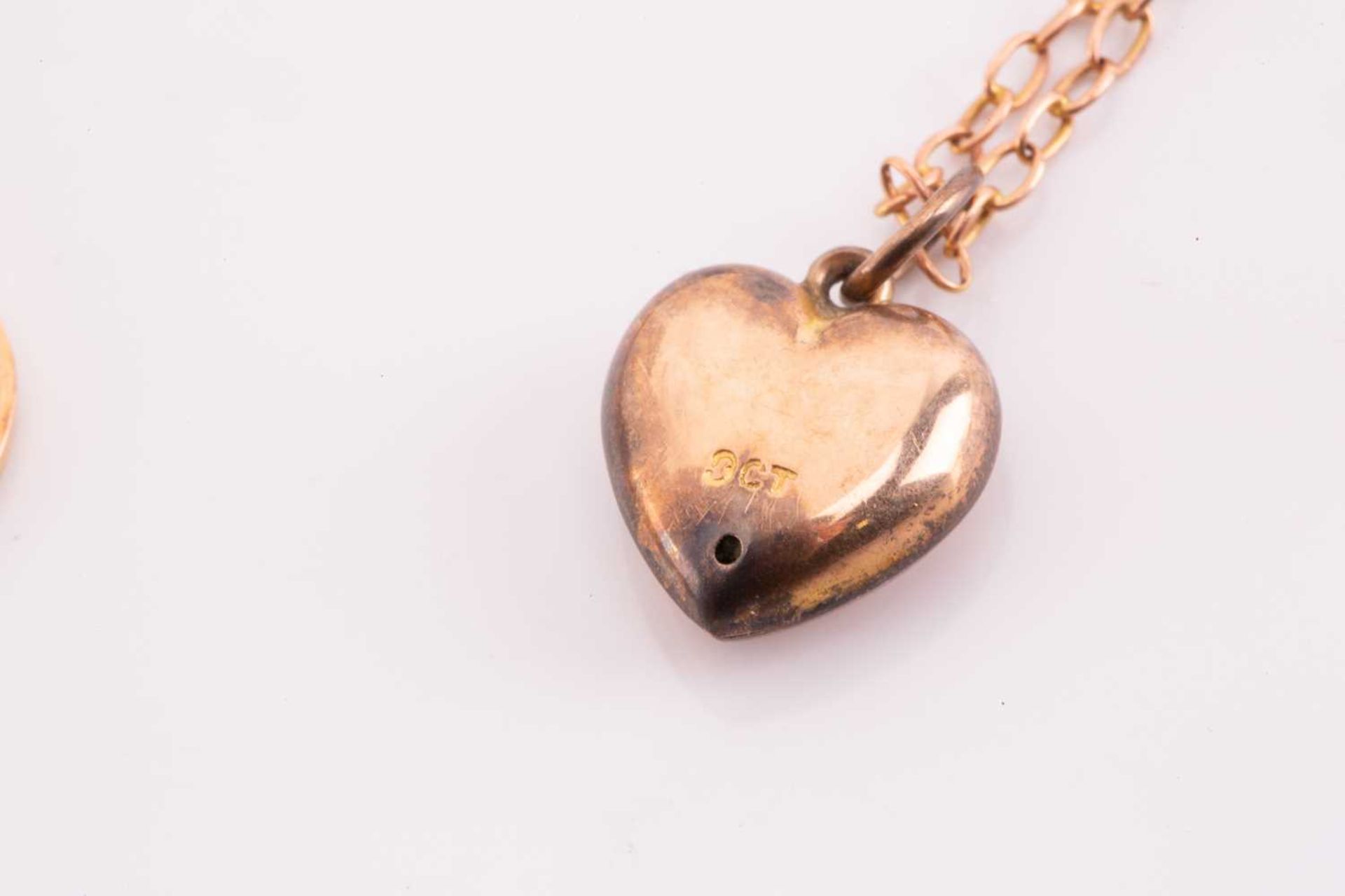 A gold Watch, two Edwardian pendants and a heart necklace, the lot comprising of a 9ct yellow gold - Image 5 of 5