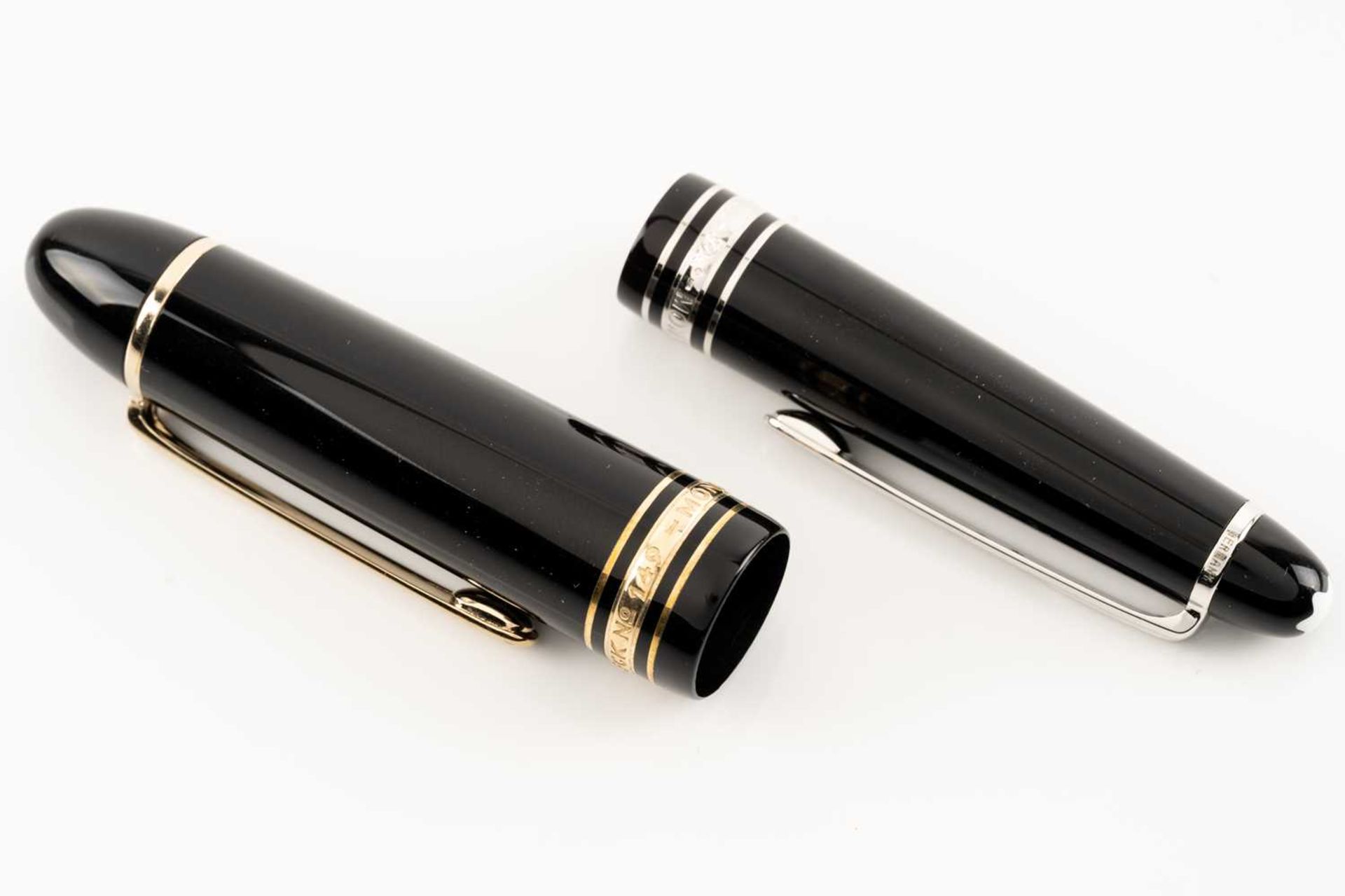 Two Montblanc fountain pens comprising a Montblanc Meisterstück Pix with twist black resin barrel, - Image 5 of 6