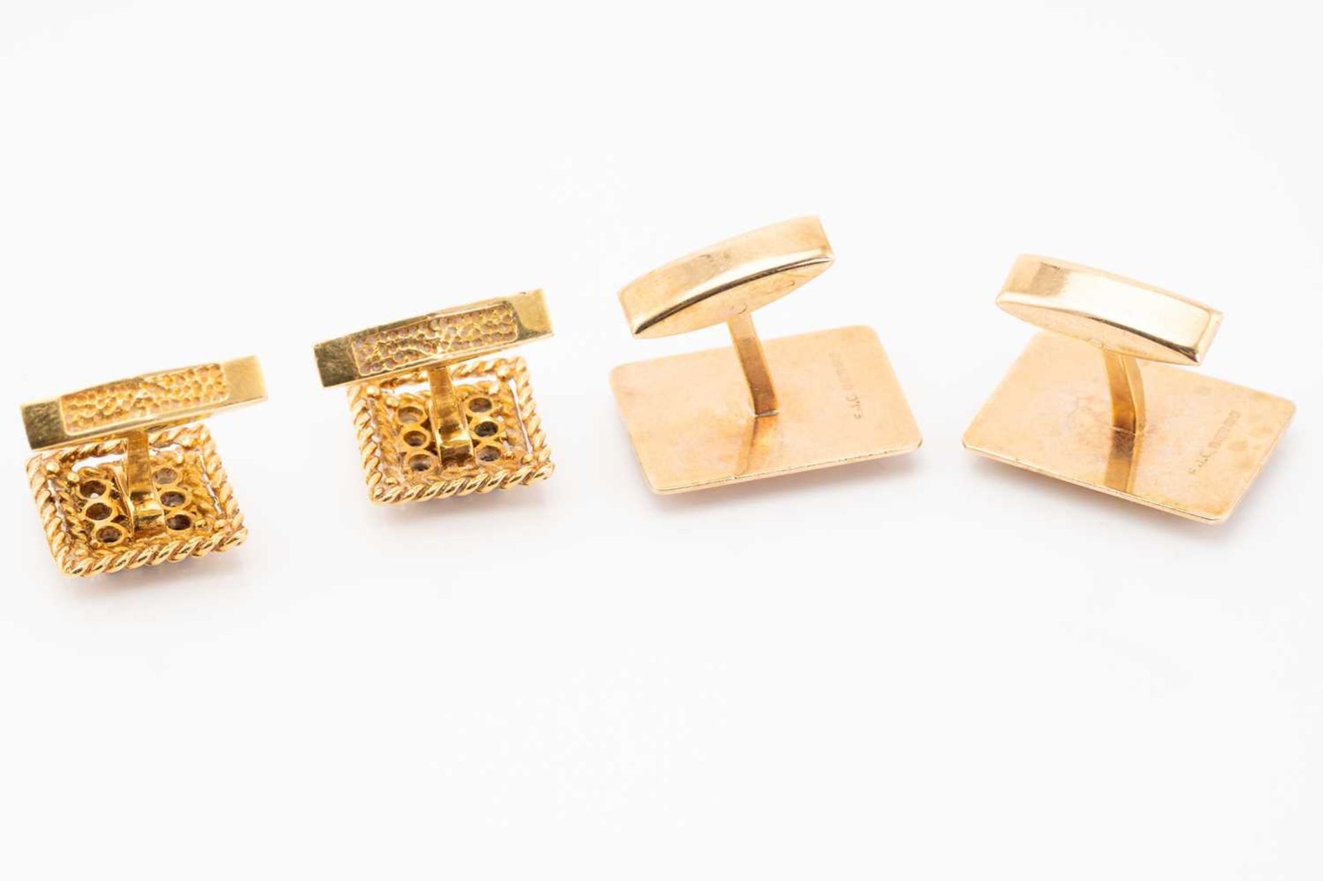 A pair of 18 carat gold and sapphire cufflinks; composed of square panels centrally set with nine - Image 3 of 5