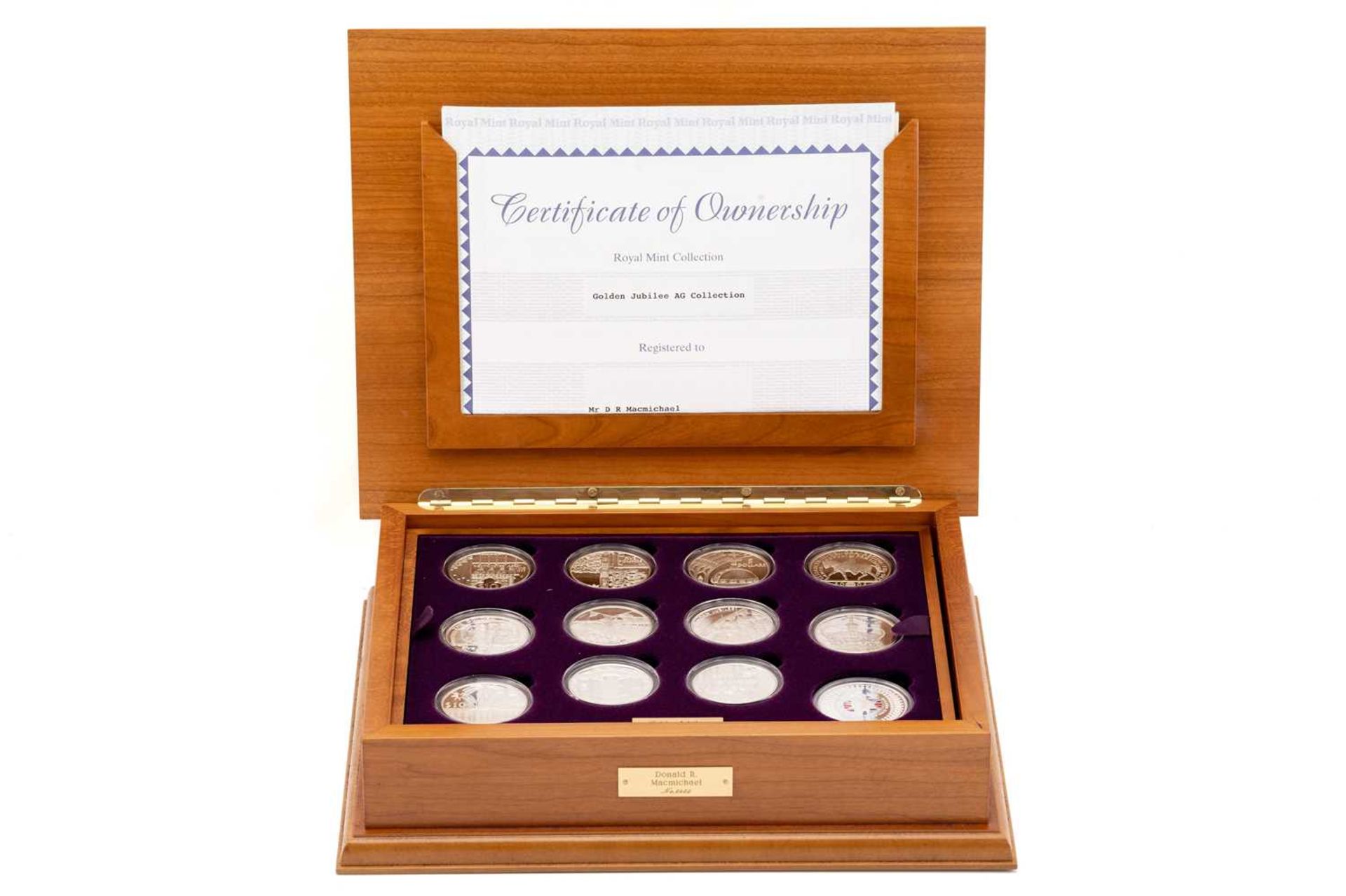 A Royal Mint Elizabeth II Golden Jubilee Collection of twenty-four silver proof crowns, no5453, in