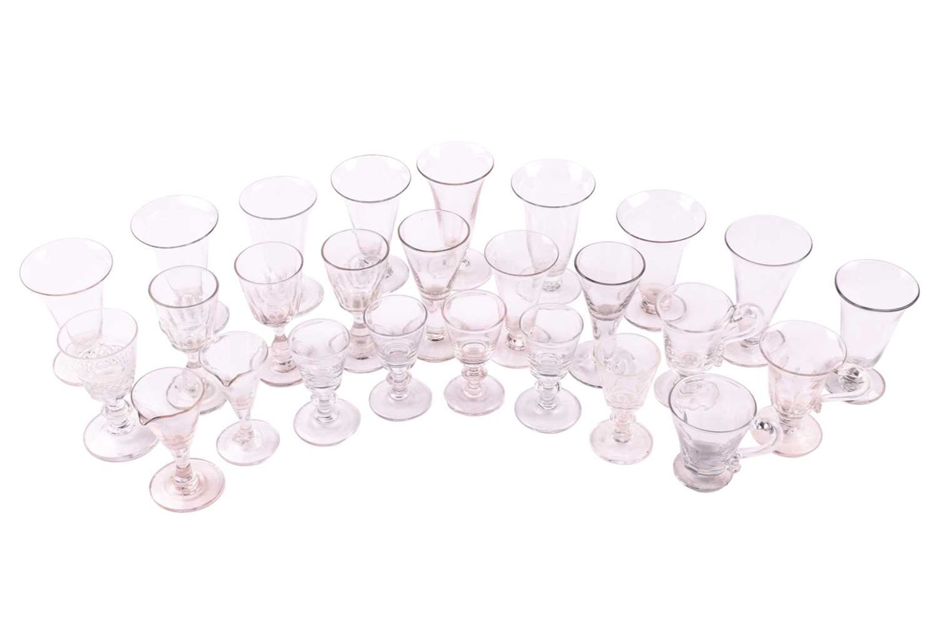 A collection of 19th century and later glasses, including custard cups, dwarf ales and other