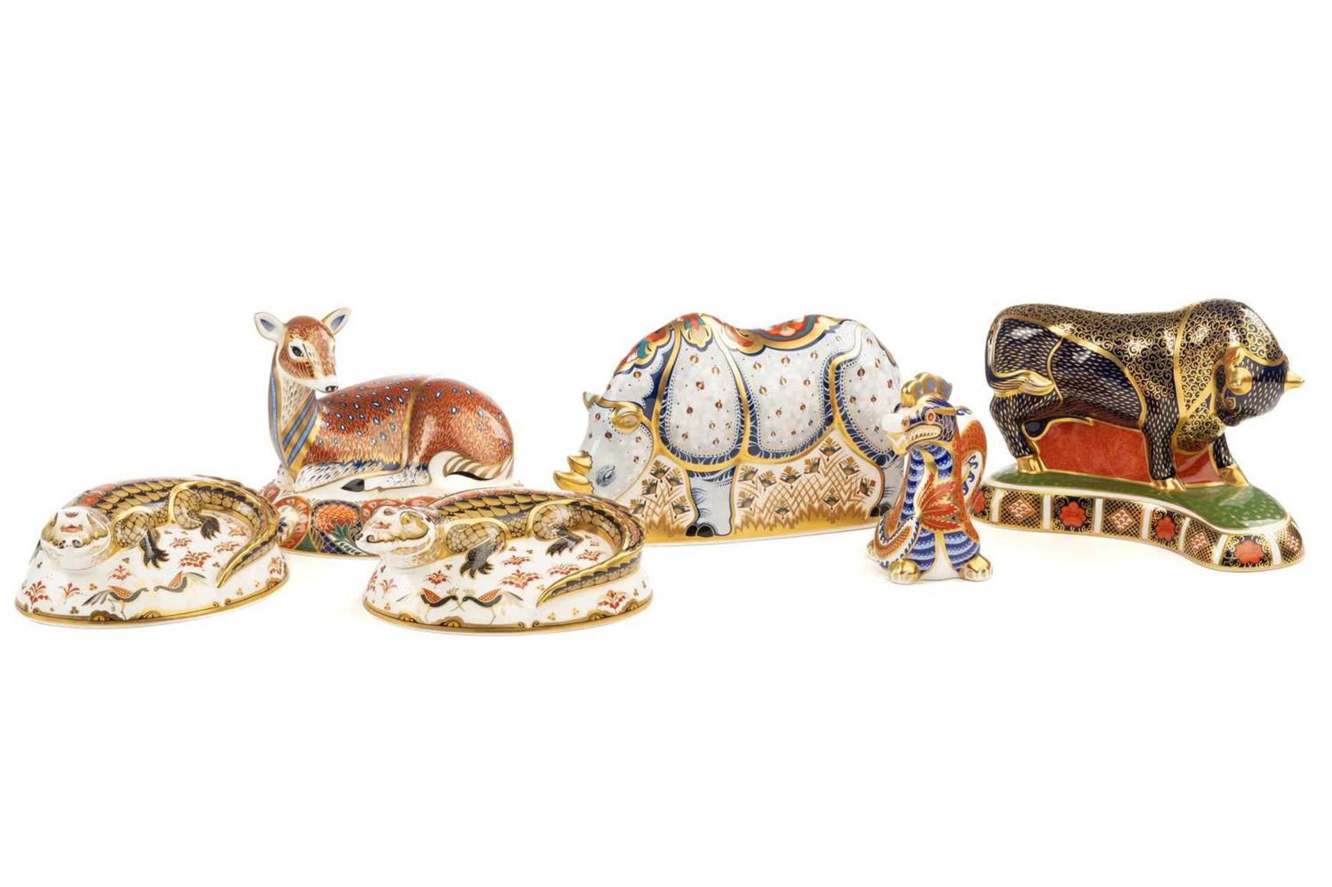 A group of six Crown Derby porcelain paperweights to include A Bull modelled Robert Jefferson,