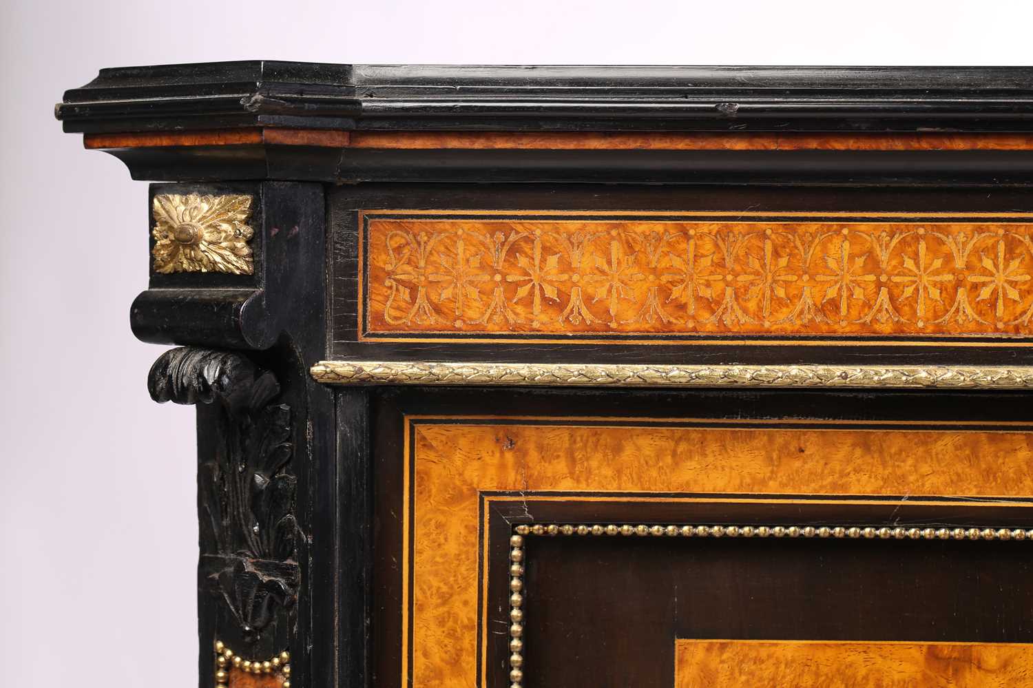 In the manner of Jackson & Graham, London, an ebonized and burr oak banded breakfront credenza, - Image 6 of 11