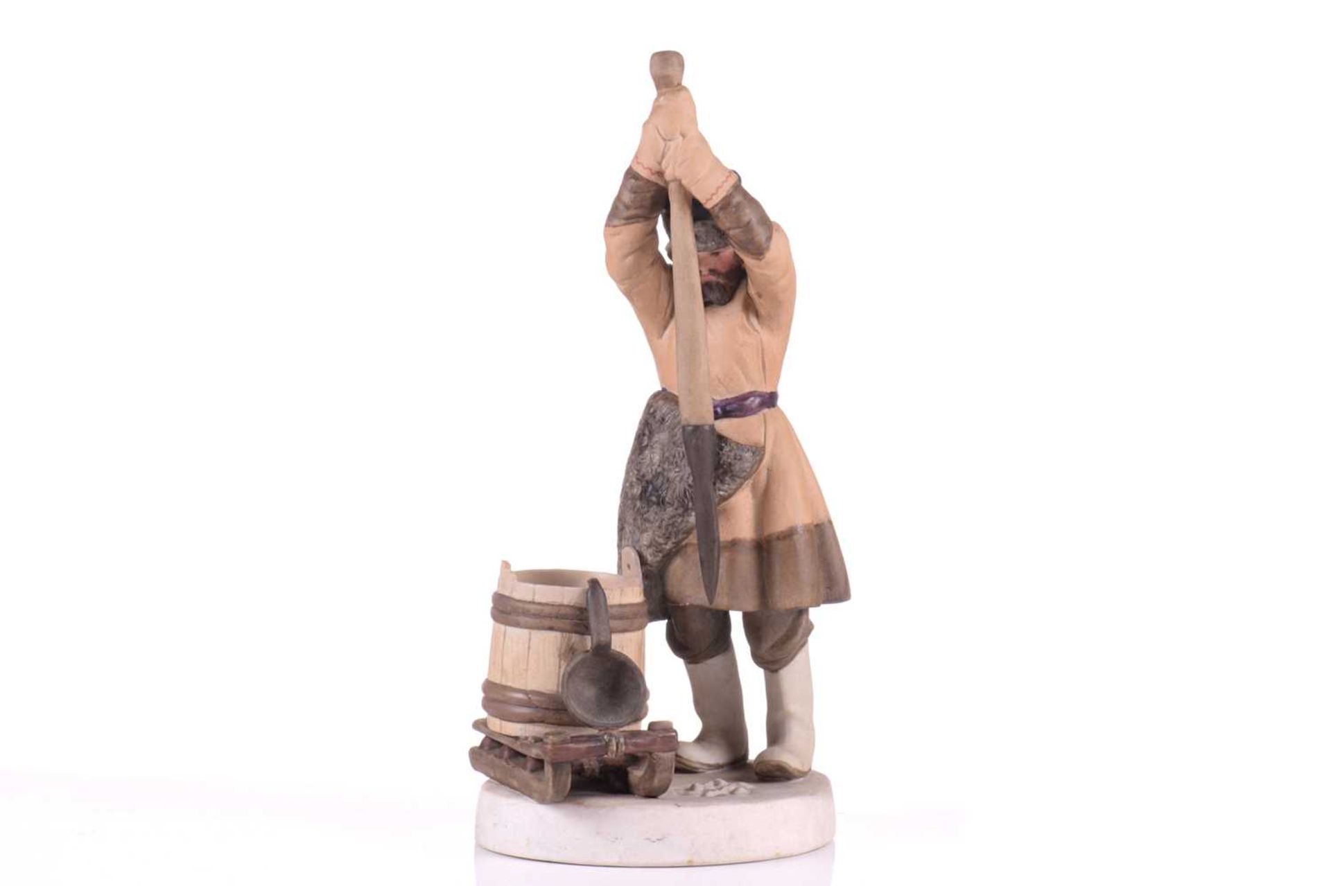 A Russian Gardner porcelain figure, 'The Ice Breaker', late 19th century, a fisherman wearing a