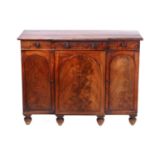 A Victorian-figured mahogany breakfront breakfast sideboard, with one long frieze drawer above three