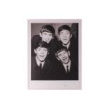 Brian Aris (contemporary), The Beatles, a black and white photographic print, signed artists