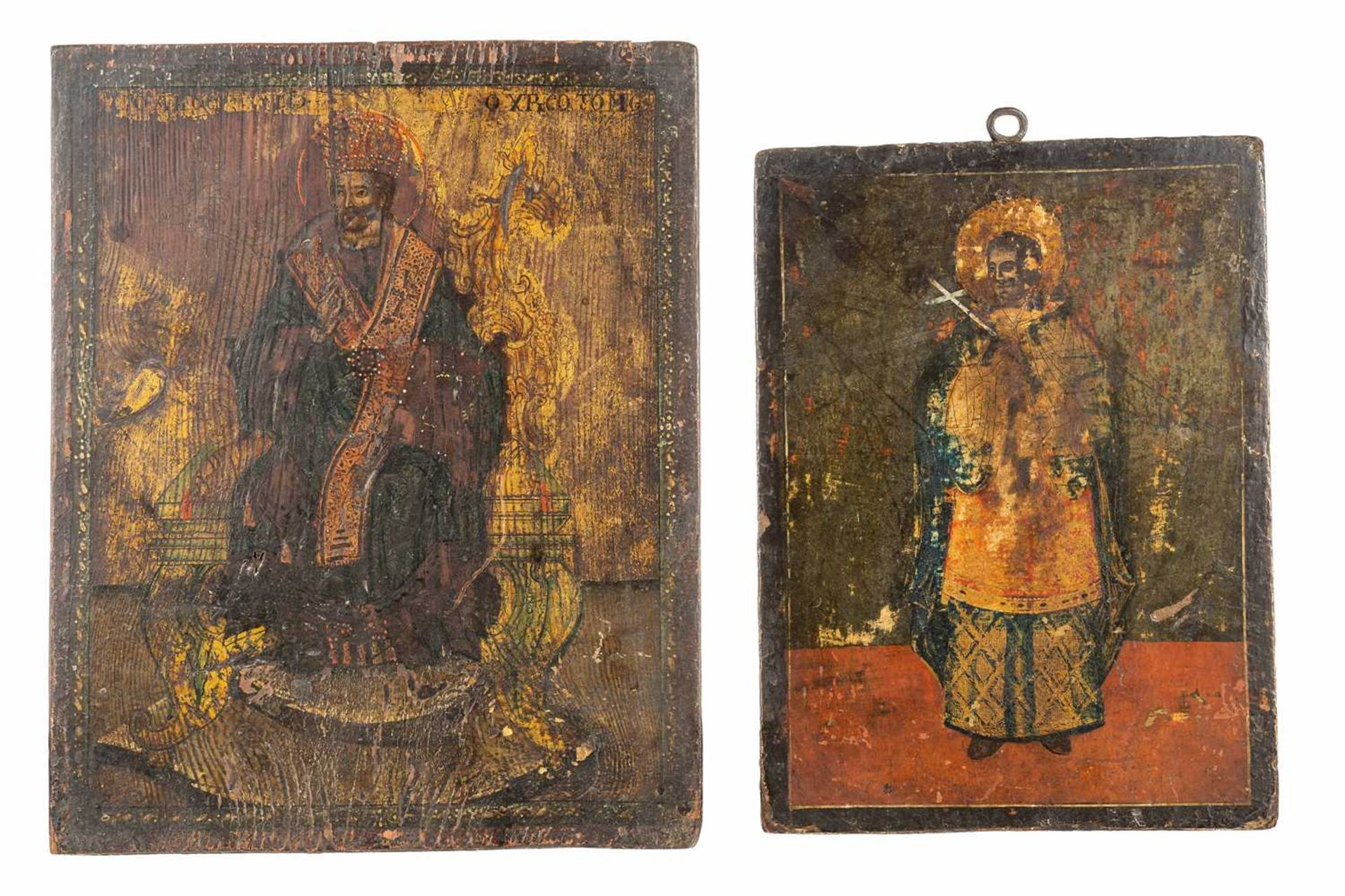 A large 19th /20th-century Russian icon painted with a single Saint in blue robes with a radiant - Image 3 of 4