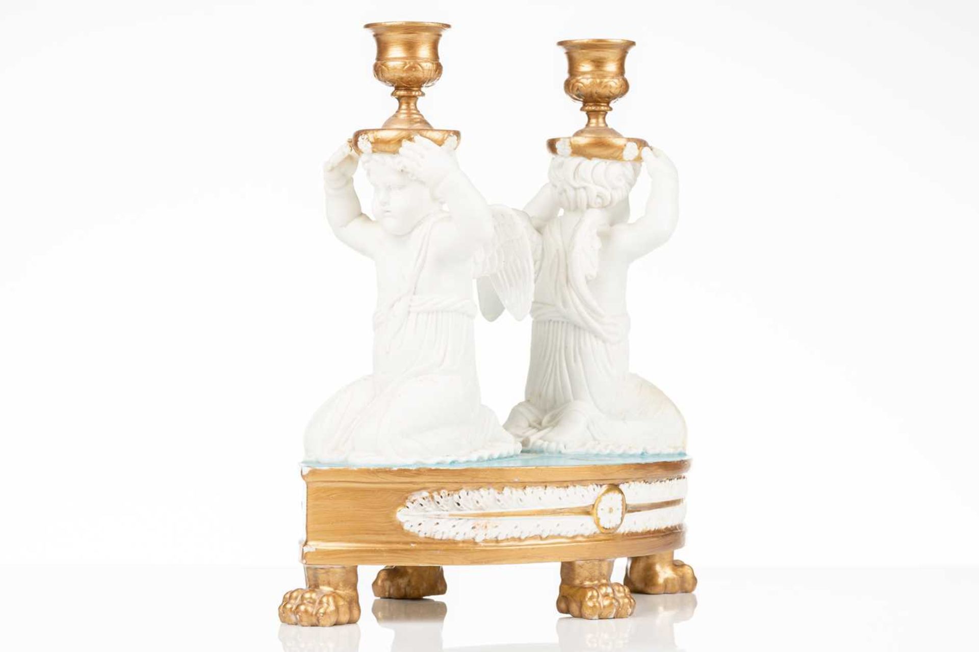 A 19th-century Jacquet et Nedonchelle (Bruxelles) porcelain double candlestick, formed with kneeling - Image 2 of 7