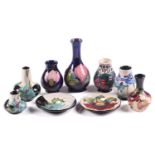 A collection of nine small pieces of modern Moorcroft pottery, including A tribute to Charles Rennie
