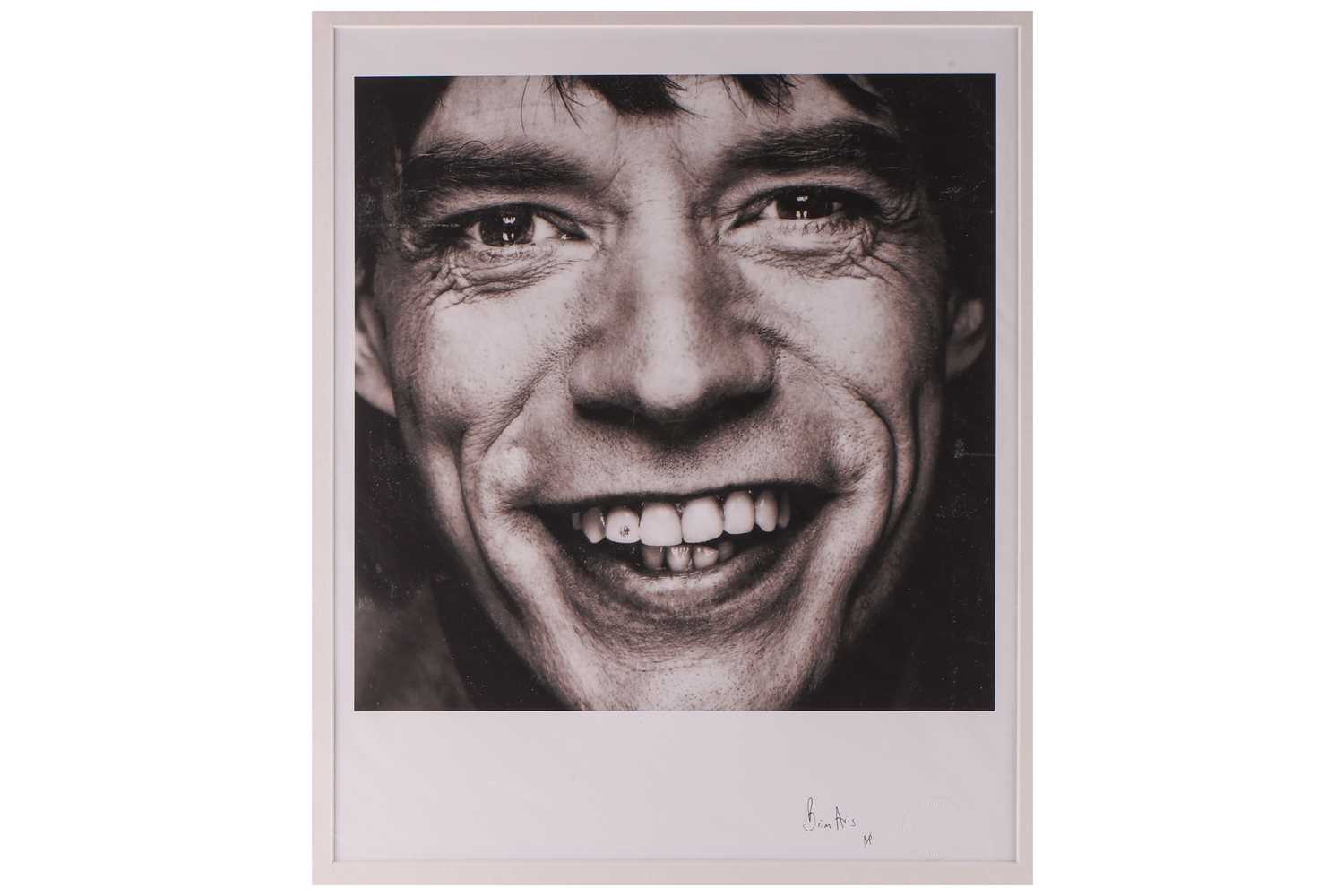 Brian Aris (contemporary), Mick Jagger with diamond tooth, a black and white photographic print, - Image 2 of 7