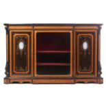 In the manner of Jackson & Graham, London, an ebonized and burr oak banded breakfront credenza,