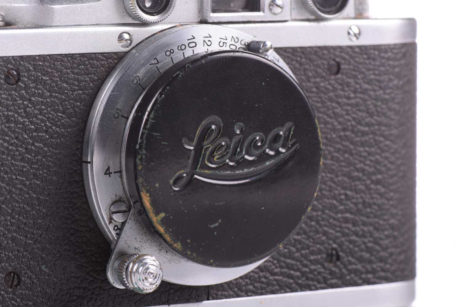 A Leitz Wetzlar Leica III Rangefinder camera, 35 mm, 1935, in original fitted leather case, serial - Image 7 of 14
