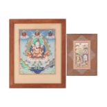 A 19th century Tibetan Buddhist Thangka, 35 cm x 28 cm glazed in an oak frame, together with a