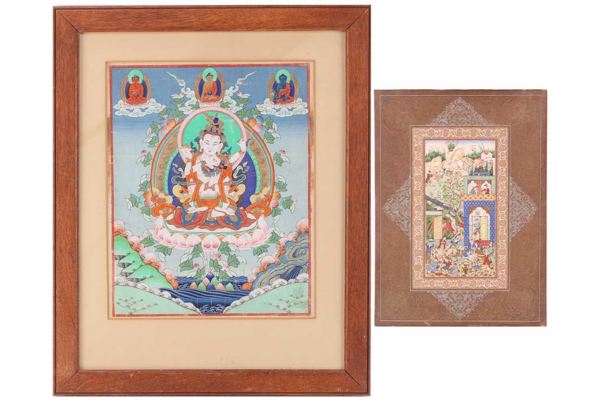 A 19th century Tibetan Buddhist Thangka, 35 cm x 28 cm glazed in an oak frame, together with a