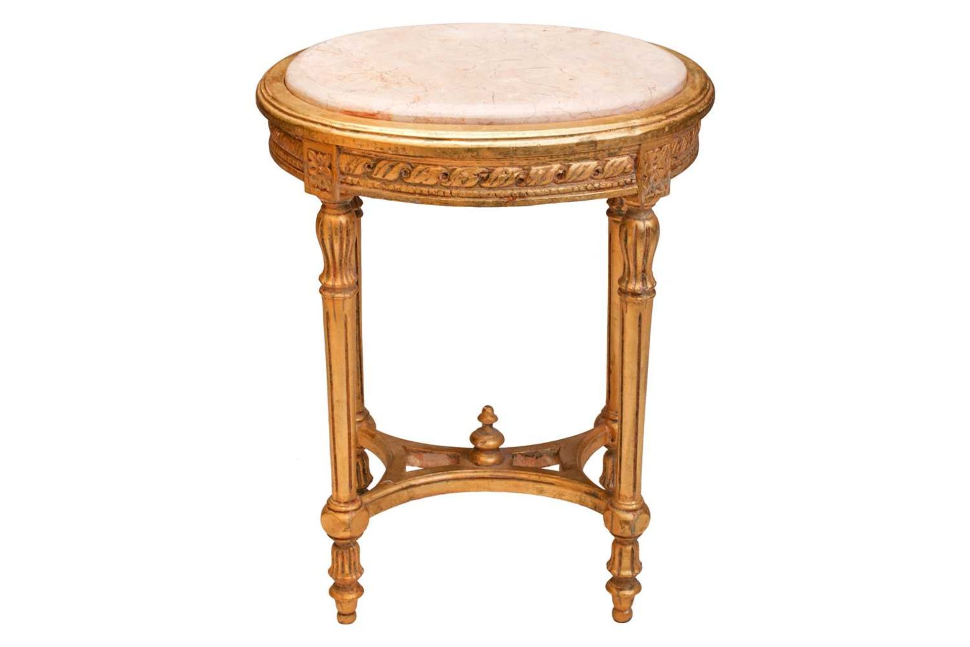 A Louis XVI style marble-topped oval giltwood table, 20th century with turned supports and shaped - Image 5 of 10