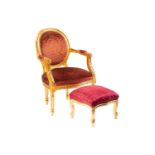 A Louis XVI style gilt wood fauteuil, 20th century, with cameo back and ribbon carved outline,