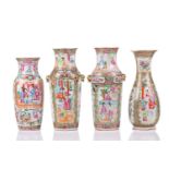 A pair of Chinese Canton enamel vases, circa 1860/1870, painted with alternating panels of