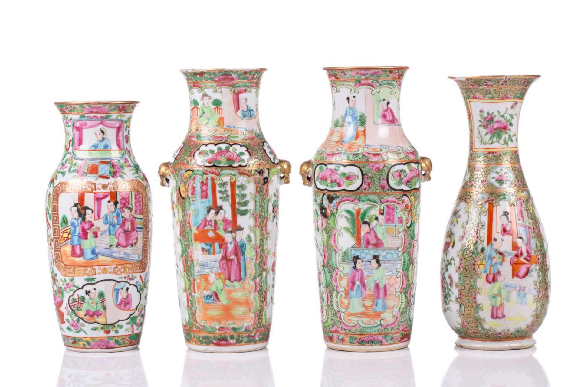 A pair of Chinese Canton enamel vases, circa 1860/1870, painted with alternating panels of