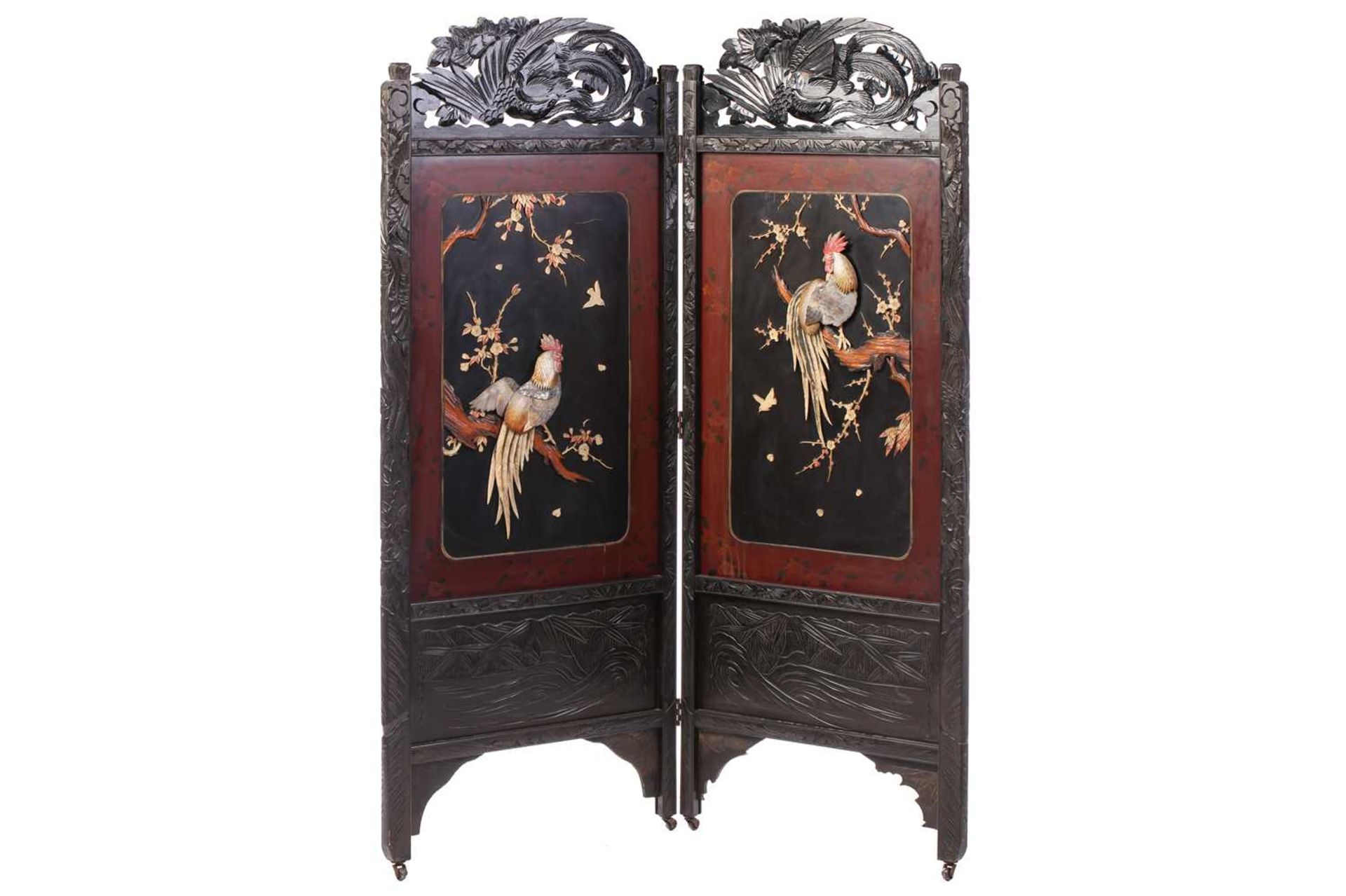 A Japanese carved and lacquered wood two-fold dressing screen, Meiji, late 19th/20th century, each