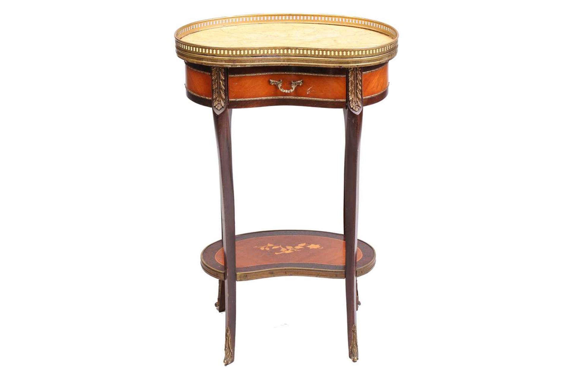 A Louis XV style marble topped kidney shaped mahogany side table, late 20th century, with pierced