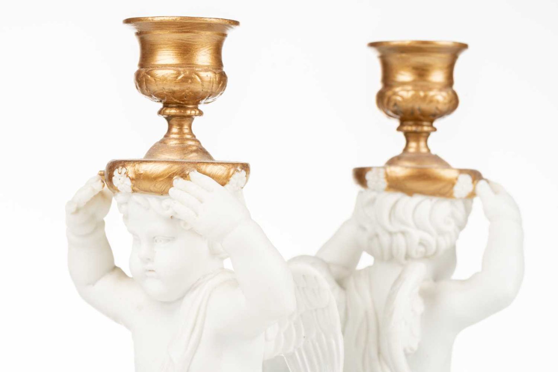 A 19th-century Jacquet et Nedonchelle (Bruxelles) porcelain double candlestick, formed with kneeling - Image 4 of 7