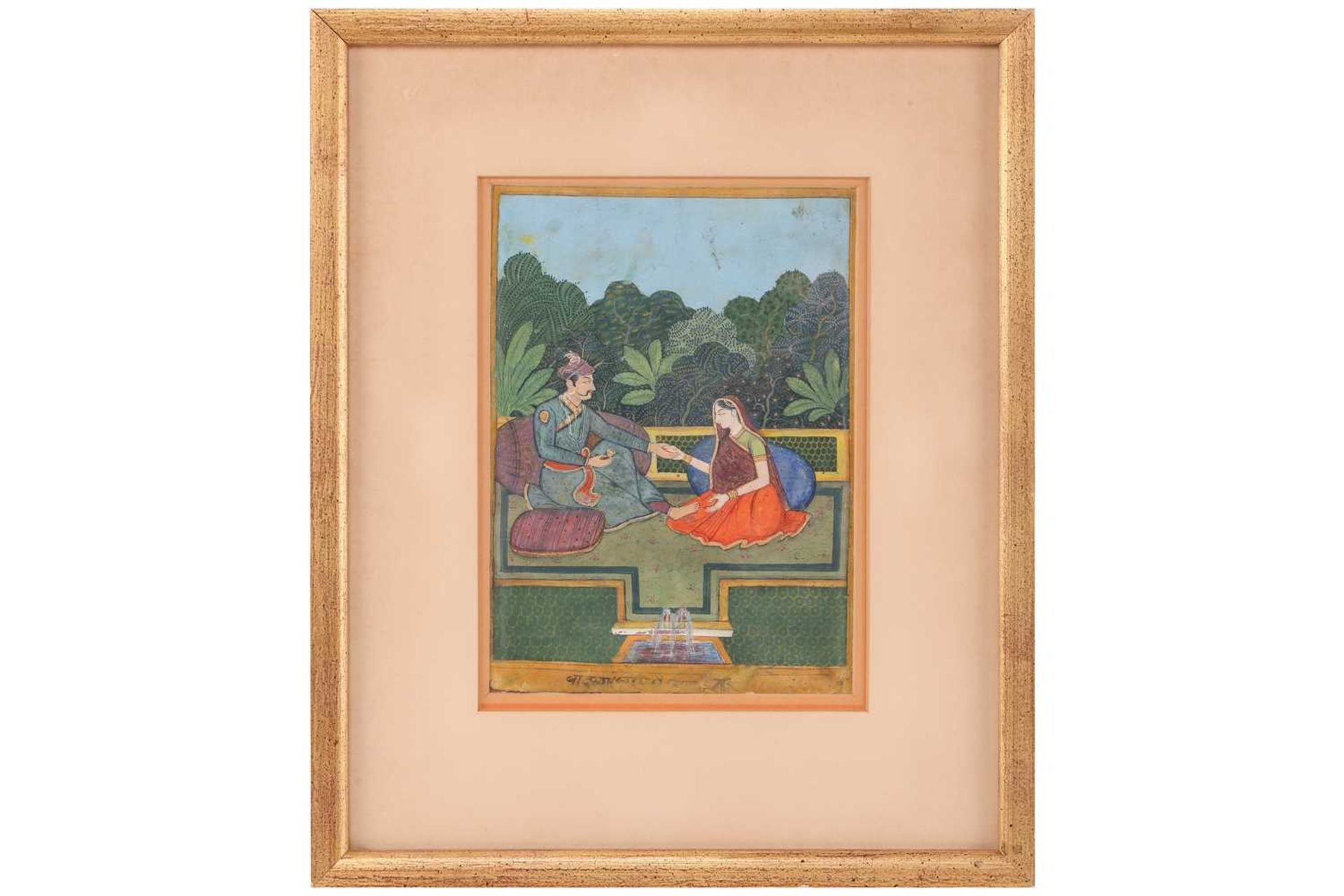 19th century Indian School, Shah and consort, seated on cushions within a fenced garden, a small