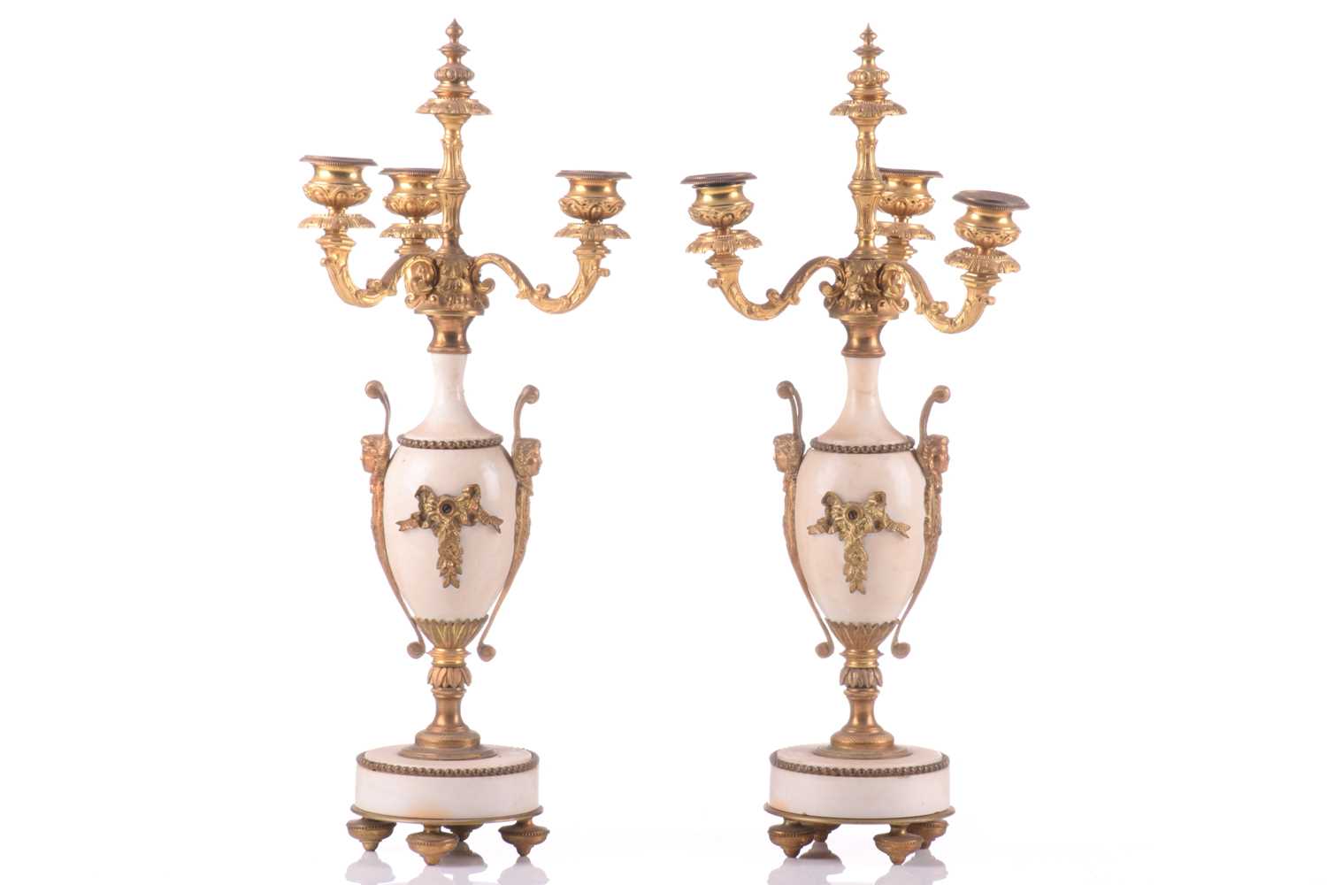 A pair of ormolu and white marble three-sconce candelabras, late 19th century, each with three