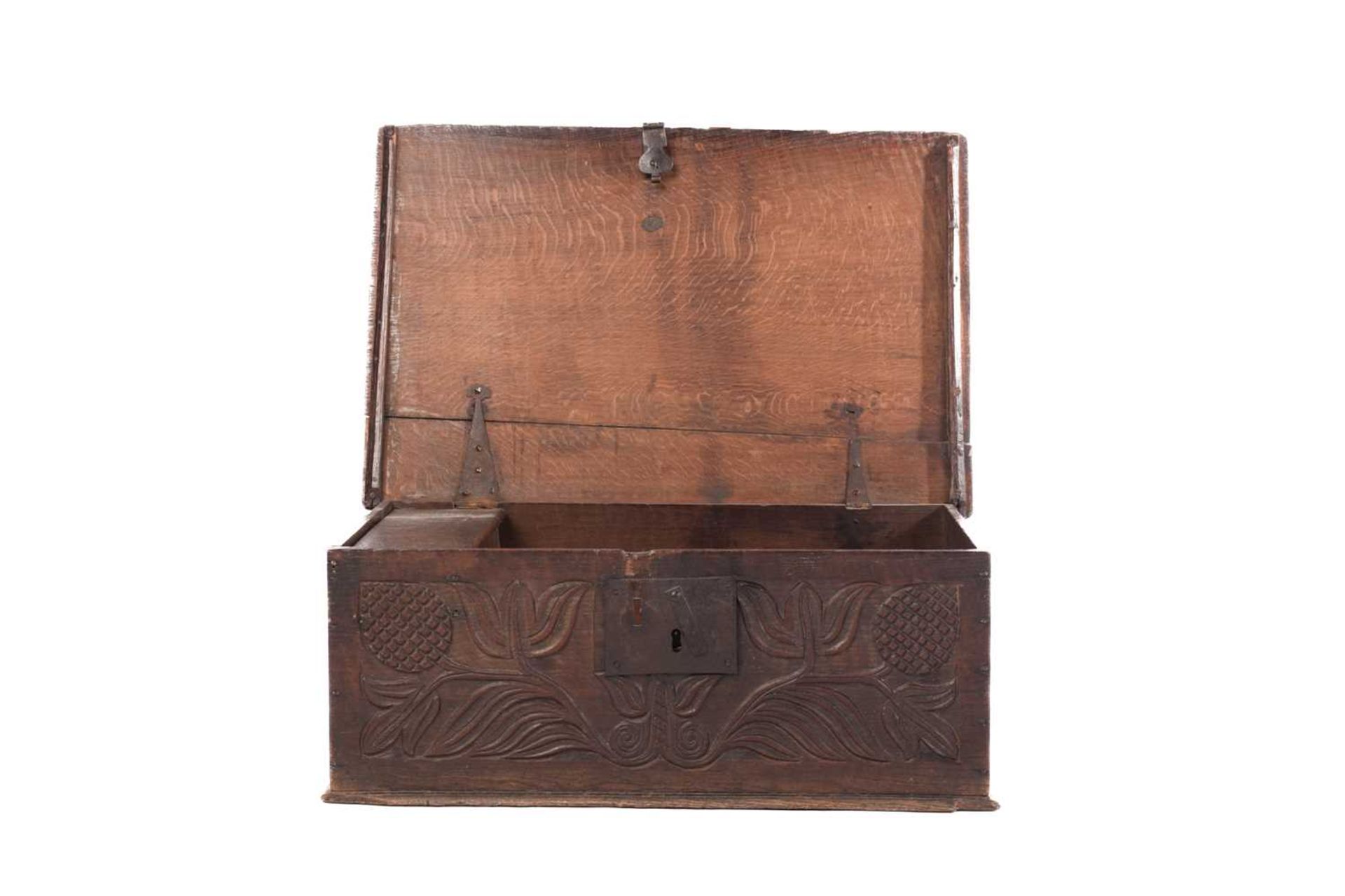 An oak bible box, 17th/18th century, of rectangular form, the front panel carved with stylised - Bild 26 aus 28
