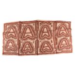 A Papua New Guinea Tapa Cloth rectangular panel worked in stylized hooked hearts and insects in