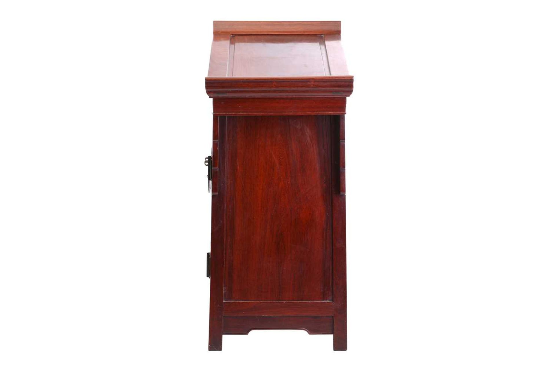 A Chinese Hongmu altar style cabinet, 20th century, the rectangular top with scroll ends above a - Bild 8 aus 8