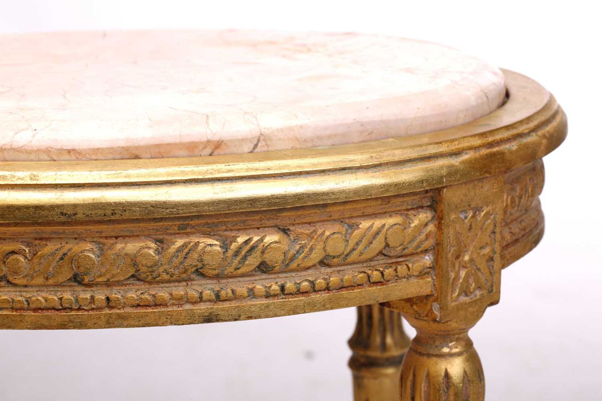 A Louis XVI style marble-topped oval giltwood table, 20th century with turned supports and shaped - Image 9 of 10