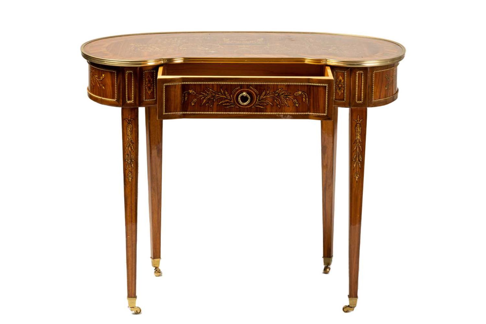 A Louis XVI style kidney shaped Kingwood bureau plat by Berry European Furniture,with inlaid and pen