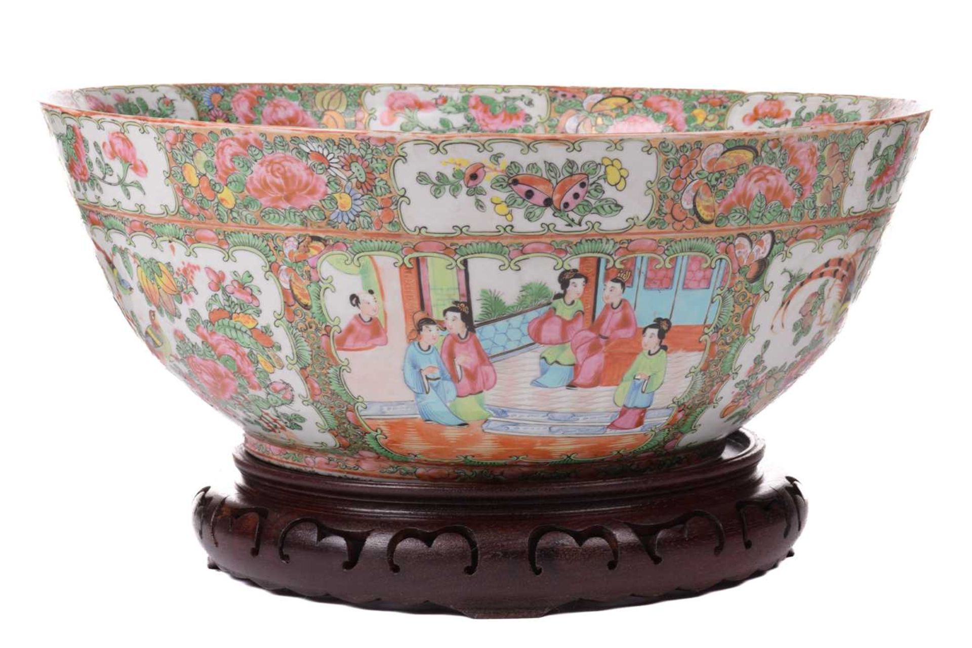 A large Cantonese 'Famille rose' enamel punch bowl, 19th century, decorated with alternating