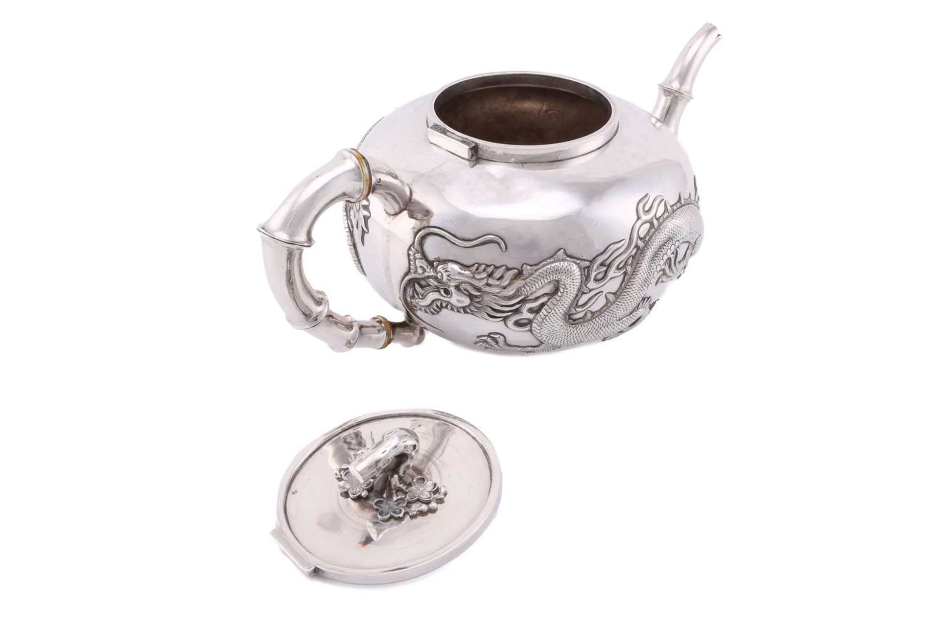 A Chinese silver four piece tea set by Wang Hing, late Qing, the covers with knops in the form of - Bild 9 aus 24