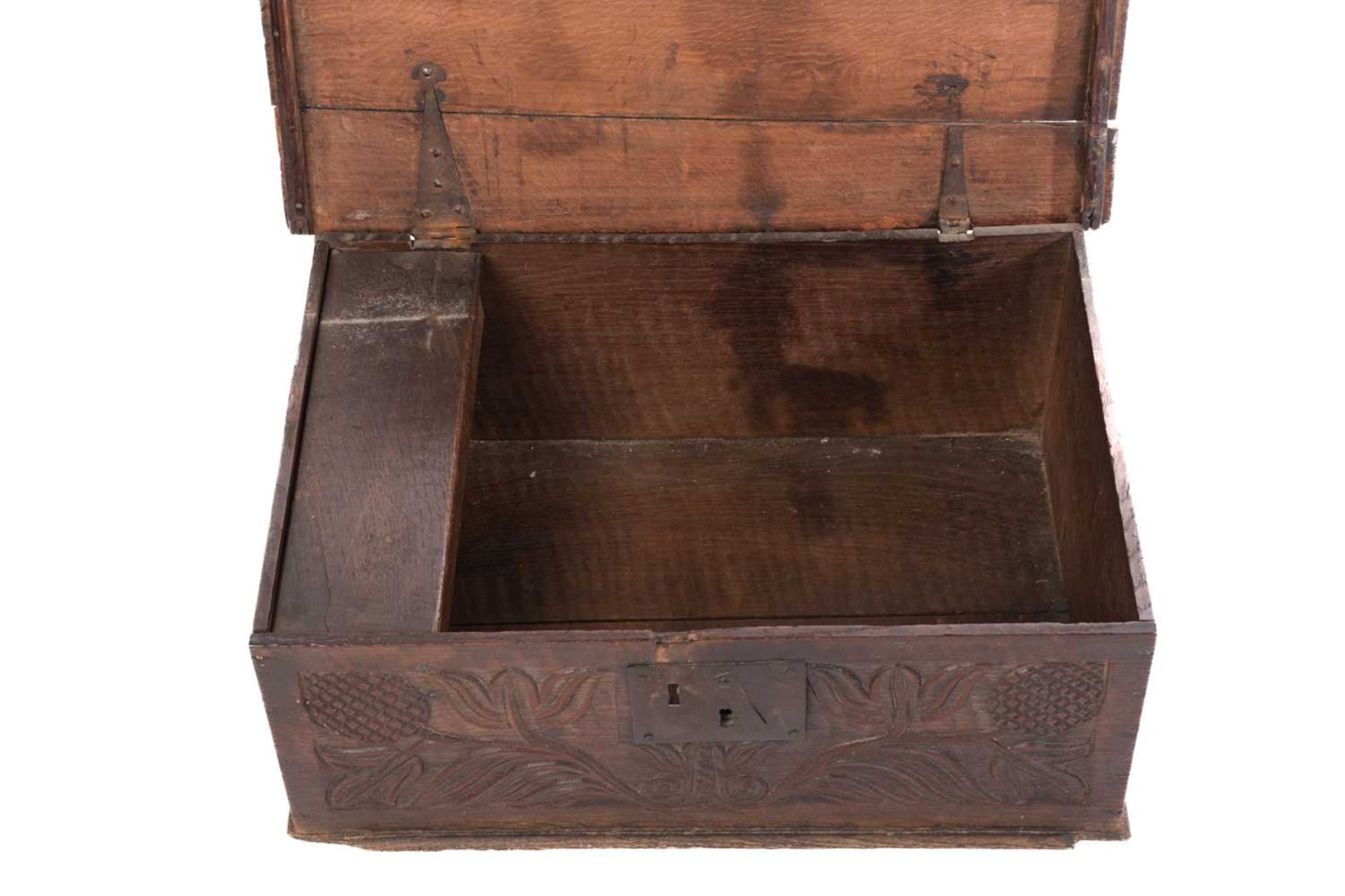 An oak bible box, 17th/18th century, of rectangular form, the front panel carved with stylised - Bild 23 aus 28