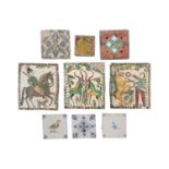 A collection of pottery tiles, comprising three Hutsul pottery stove tiles, depicting a dancing