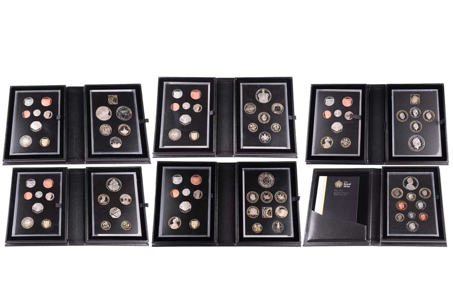 A collection of boxed Royal Mint proof coin sets to include, 2012, 2015, 2014, 2018, 2013, and