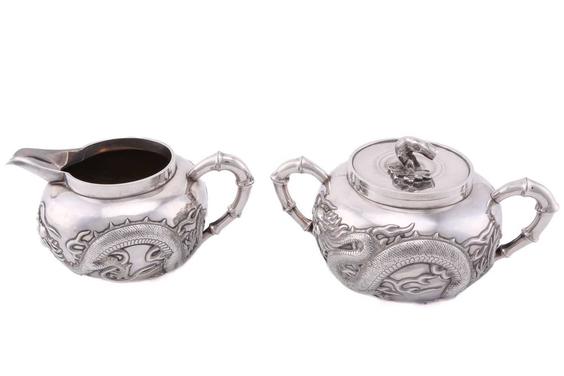 A Chinese silver four piece tea set by Wang Hing, late Qing, the covers with knops in the form of - Bild 11 aus 24