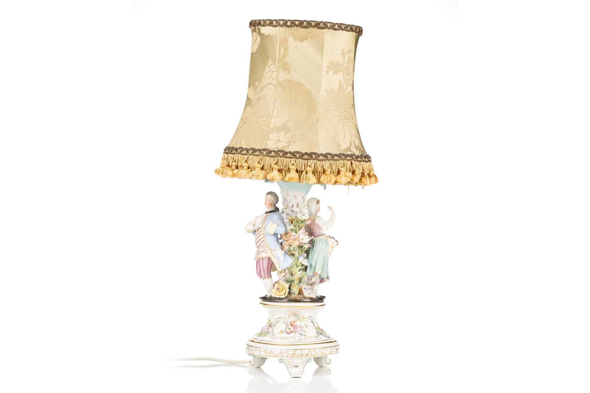 An early 20th-century Potschapel figural porcelain table lamp, modelled as a lady and gallant in