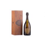 A bottle of 1992 Cuvée Dom Perignon Champagne, in an associated 1986 'Rosé' Dom Perignon wooden