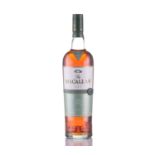 A bottle of Macallan Triple Cask Matured Fine Oak Highland Single Malt Whisky, 25 Years old,