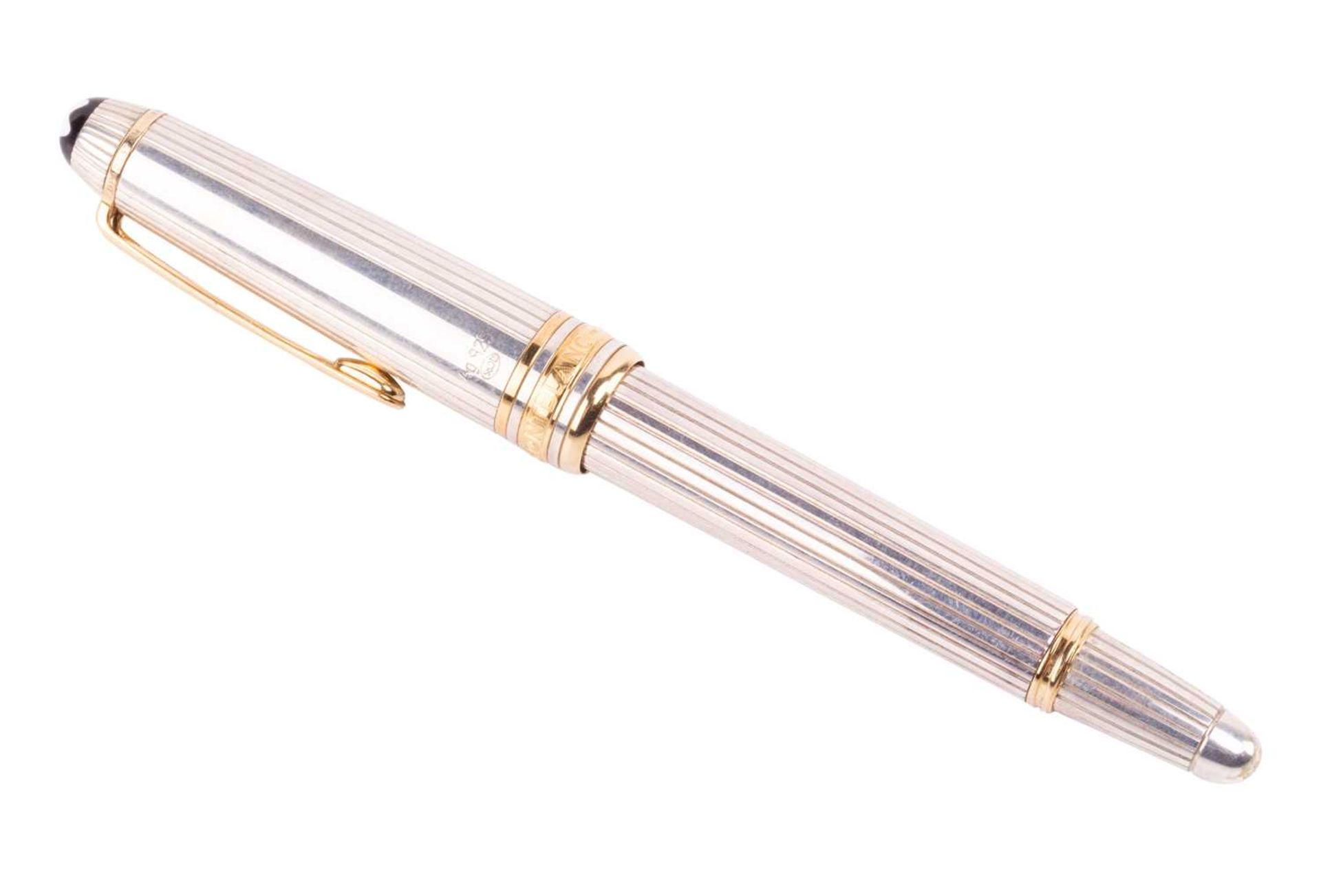 Montblanc Meisterstück silver fountain pen with gold-tone hardware, emblem inlaid into pull-off