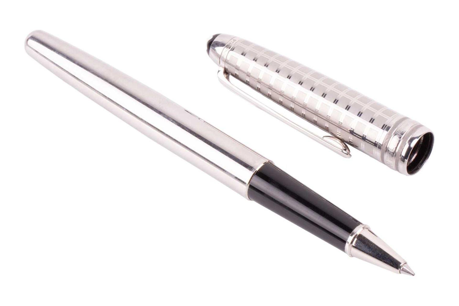 MontblancMeisterstück roller ball pen, the steel pull-off cap with inlaid emblem to the crown and