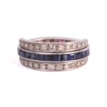 An Art Deco 'Night and Day' flip-over eternity ring, with half of the central band channel set