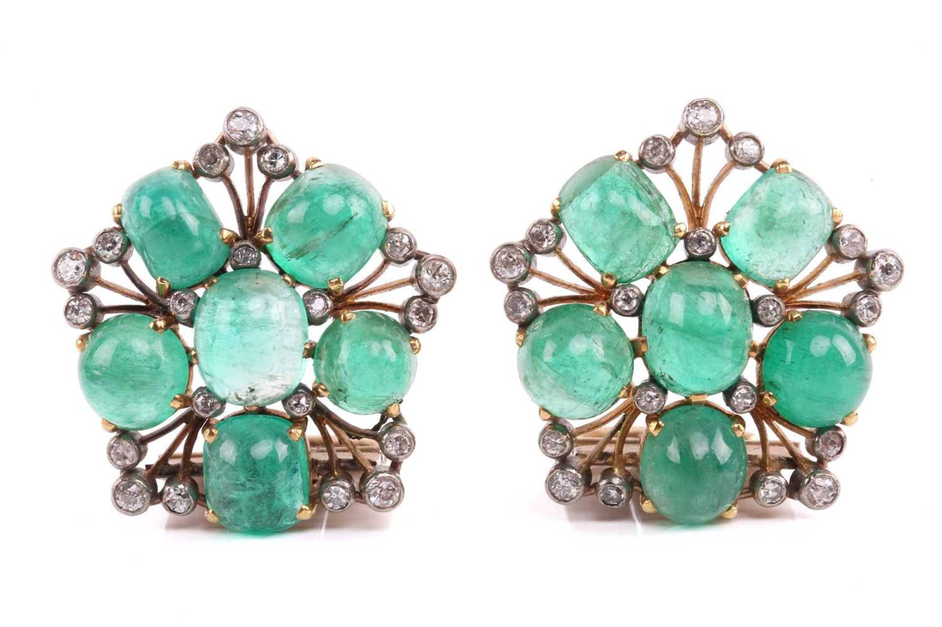 A pair of emerald and diamond cluster dress clips, the pentagonal plaques each consist of six